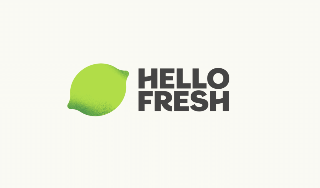 HelloFresh logo featuring a green lime graphic on the left and the words HELLO FRESH in bold, black letters on the right, set against a plain light background.