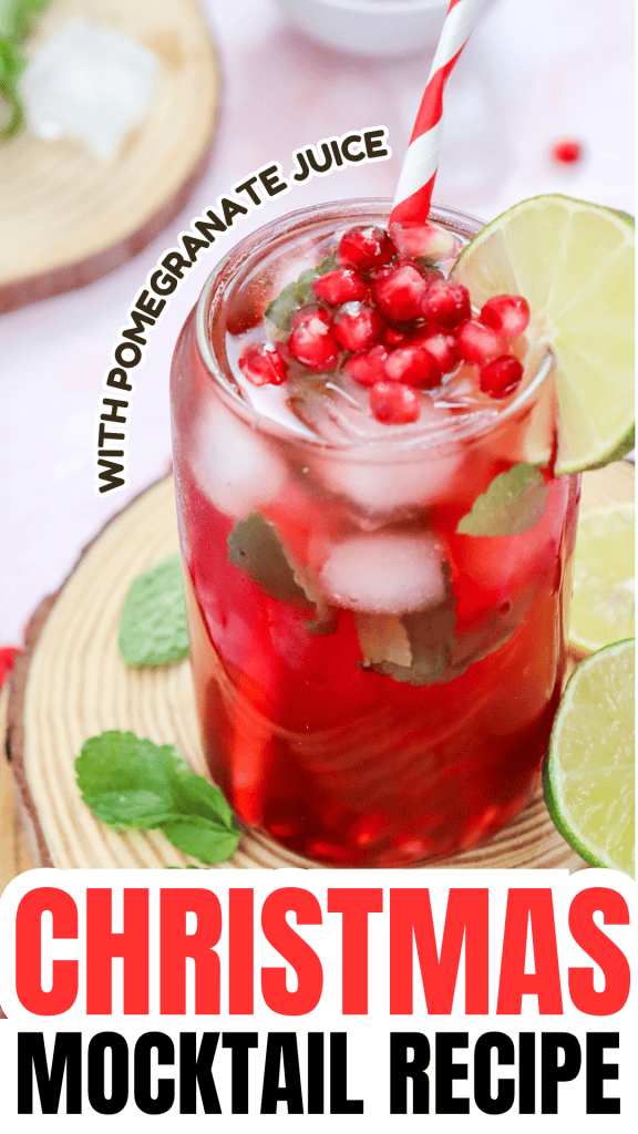A festive glass of easy holiday mocktail with ice, pomegranate seeds, mint, and lime slices, garnished with a red-and-white striped straw. Text reads With pomegranate juice and Christmas Mocktail Recipe.
