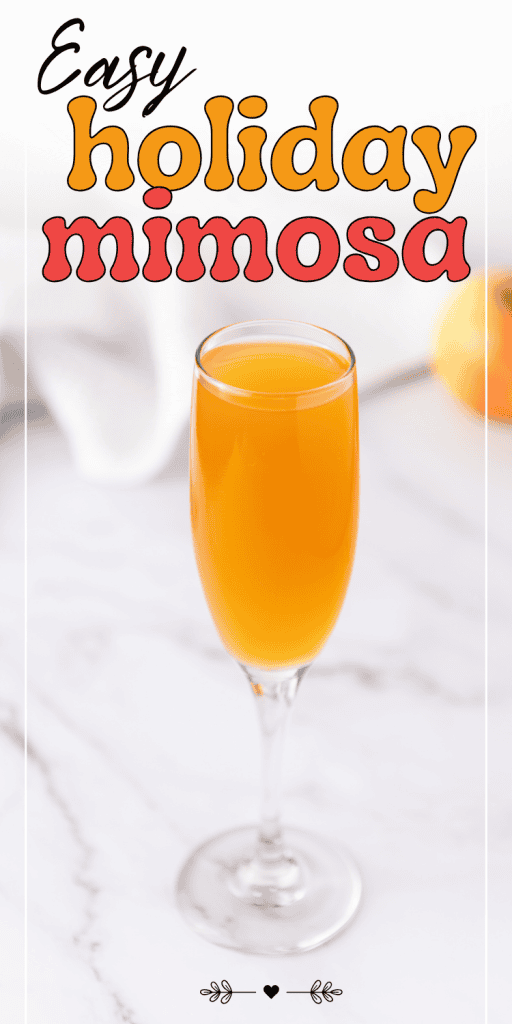 A glass of sparkling holiday mimosa sits on a white marble surface with text above reading Easy holiday mimosa. The background is lightly blurred, highlighting the festive drink.