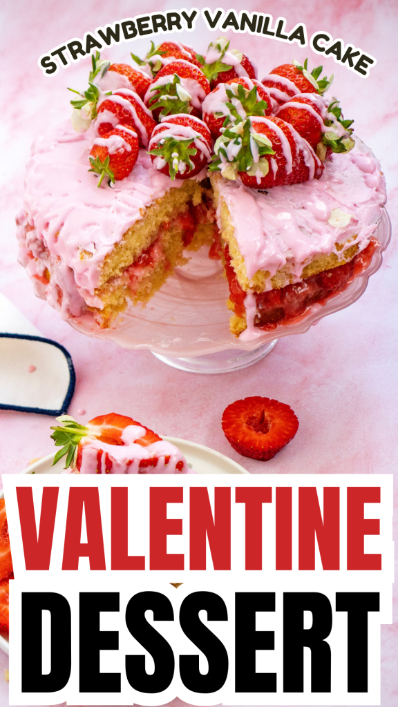 Strawberry vanilla cake with pink icing and fresh strawberries on top, displayed on a glass stand with a slice removed. Text reads “Valentine Dessert” and “Strawberry Vanilla Cake”—the perfect Valentine’s Day cake for your celebration.