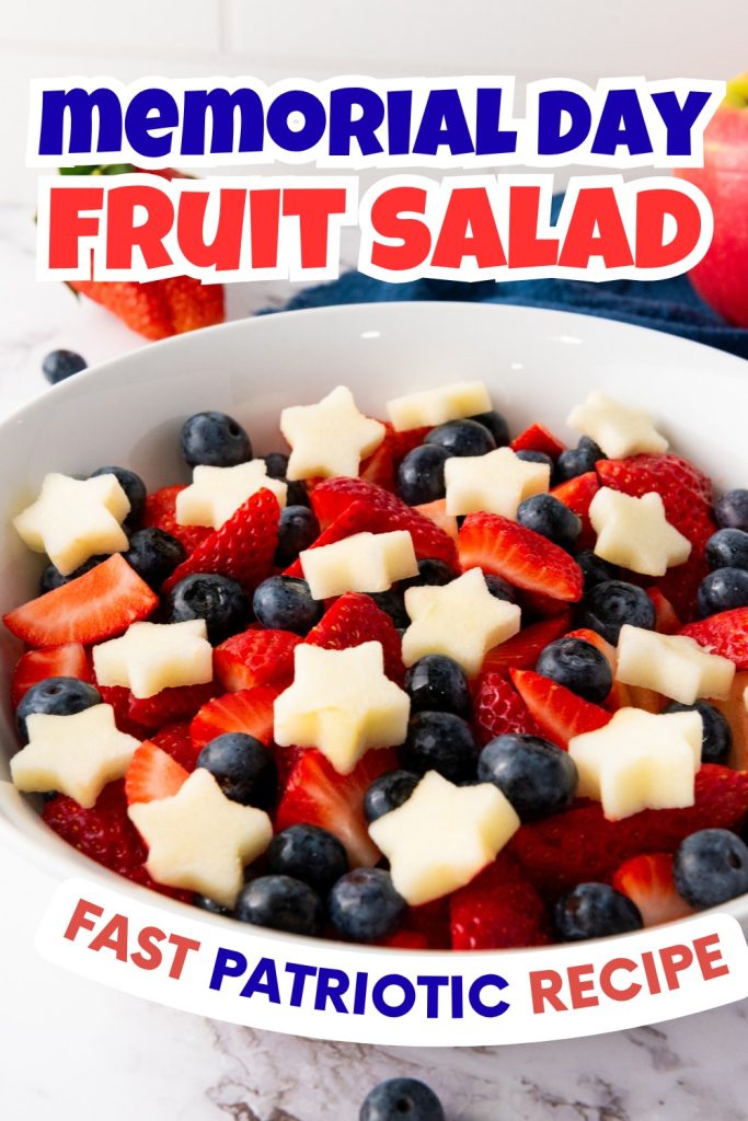 A bowl of Memorial Day Fruit Salad features blueberries, sliced strawberries, and star-shaped apple pieces. Text on the image reads Memorial Day Fruit Salad and Fast Patriotic Recipe.