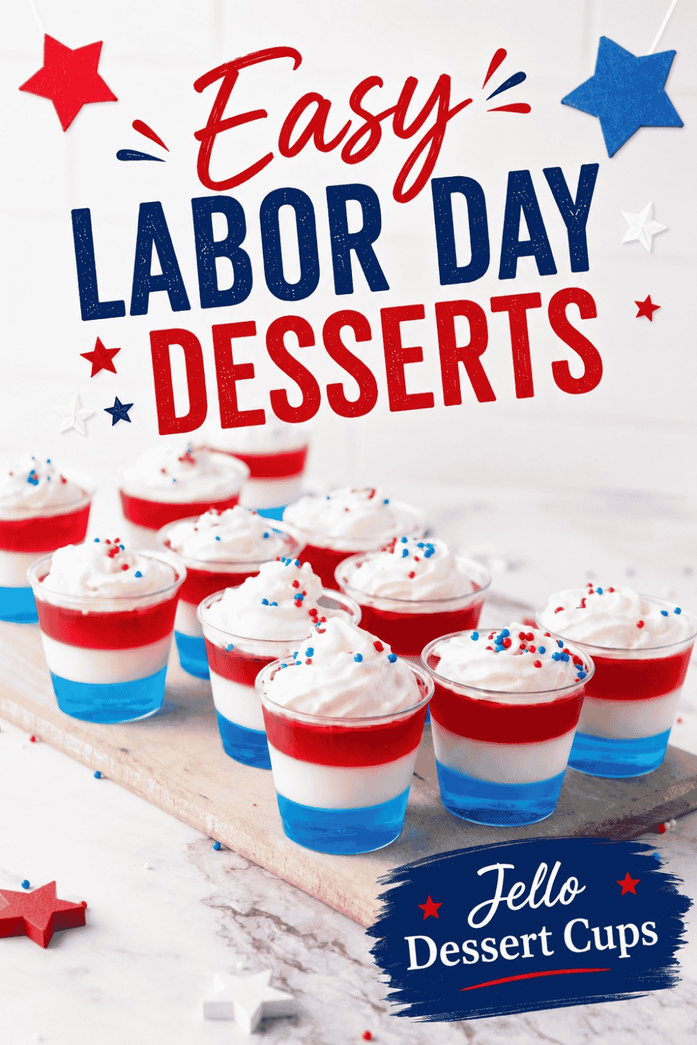 Red, white, and blue Jello dessert cups with whipped topping and sprinkles on a board make the perfect treat for summer celebrations. Text above reads “Easy Labor Day Desserts—Jello Dessert Cups.” Patriotic stars decorate the image, adding festive flair to these easy Labor Day desserts.