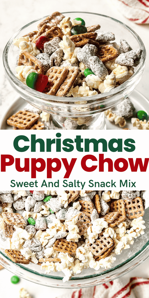 Christmas puppy chow, or reindeer munch, served in a glass pedestal bowl, containing popcorn, pretzels, and holiday-colored candies coated in powdered sugar.